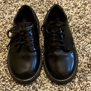 Black patent leather looking dress shoes